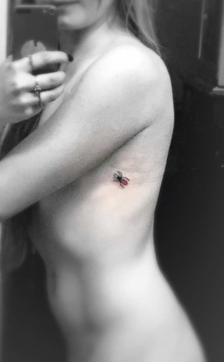 pink spider tattoo